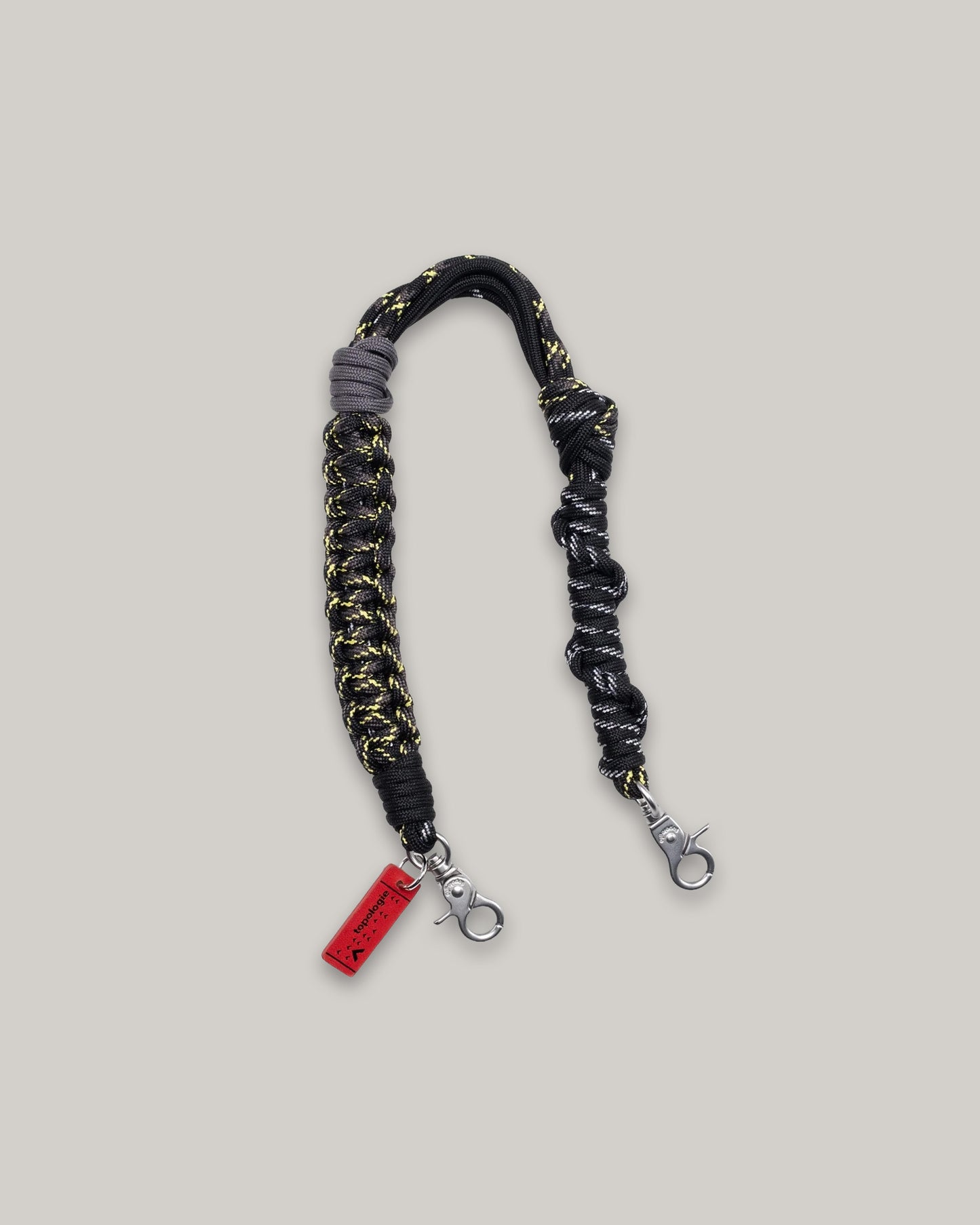 TOPOLOGIE MACRAME WRIST STRAP COAL