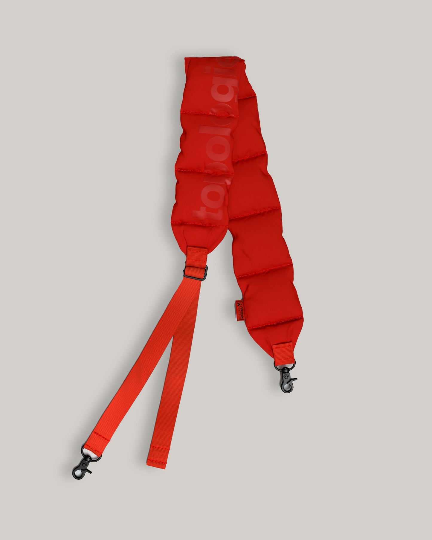 TOPOLOGIE PUFFER STRAP RED TECH SATEEN