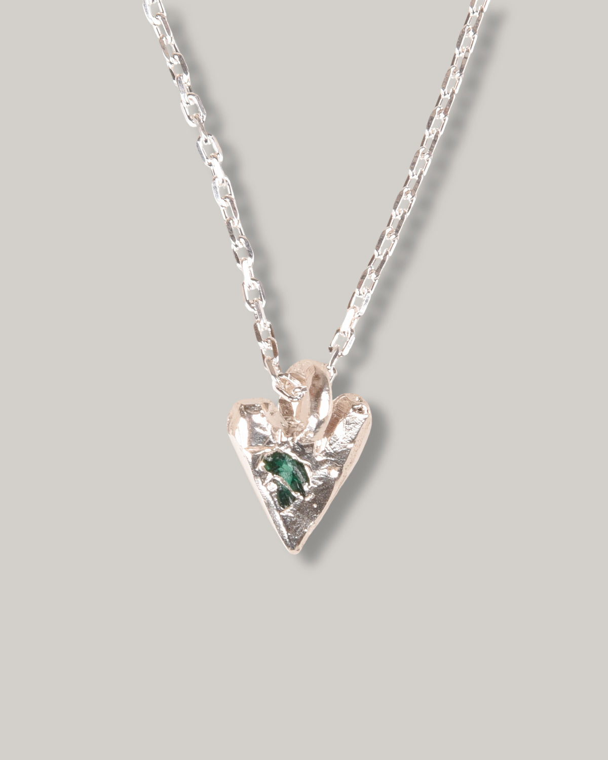 THE OUZE RAW EMERALD HEART NECKLACE - STERLING SILVER