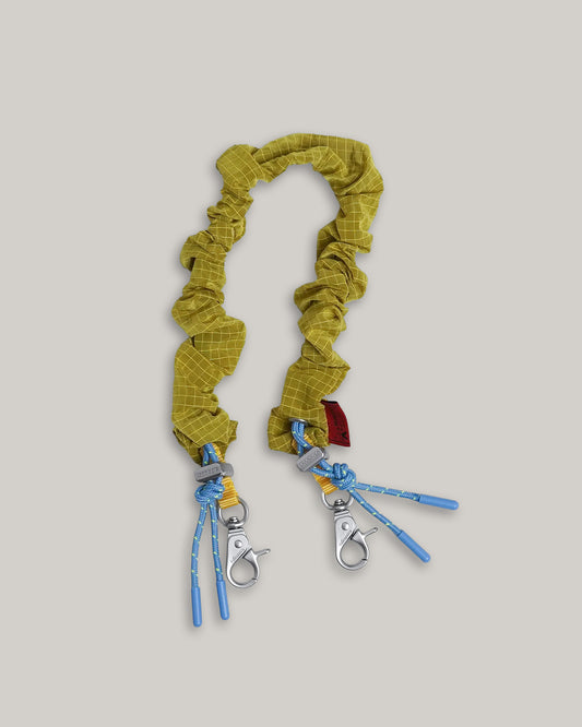 TOPOLOGIE BUNGEE WRIST STRAP MUSTARD